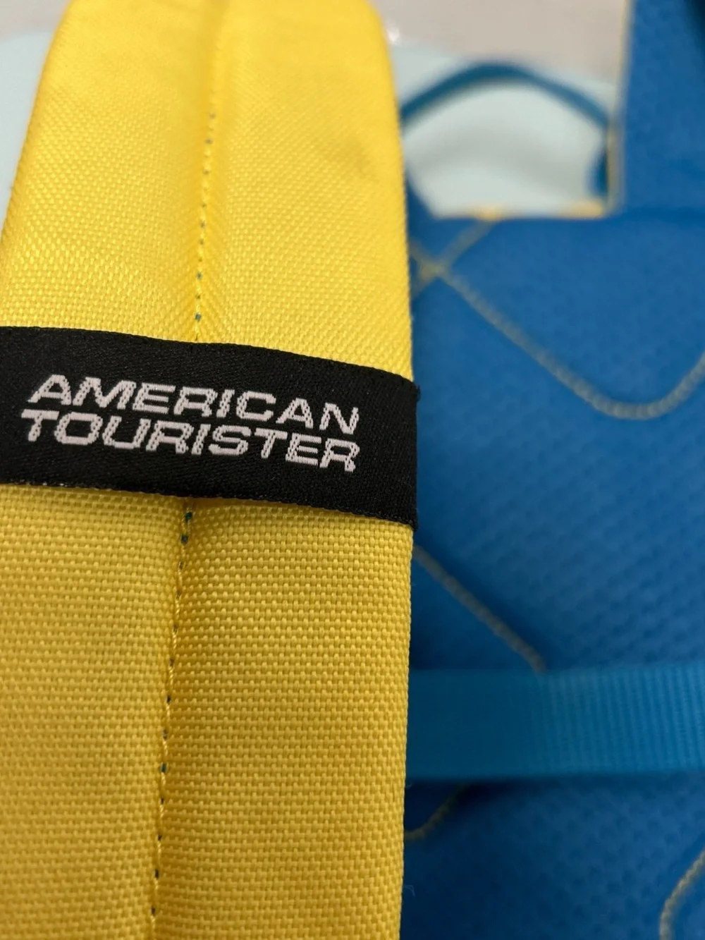 American Tourister Kids Colorblock Backpack - Yellow, Orange, Teal, Blue